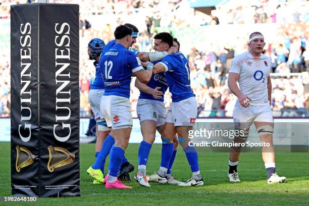 Tommaso Allan of Italy celebrates after scoring a try during the Guinness Six Nations 2024 match between Italy and England at Stadio Olimpico on...