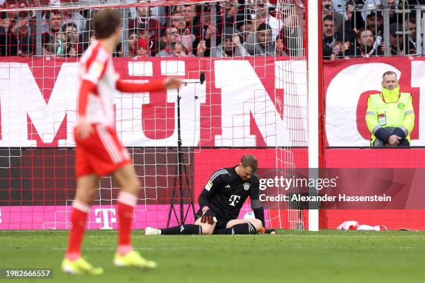 Manuel Neuer of Bayern Munich looks dejected after failing to make a save against Nico Elvedi of Borussia Moenchengladbach during the Bundesliga...