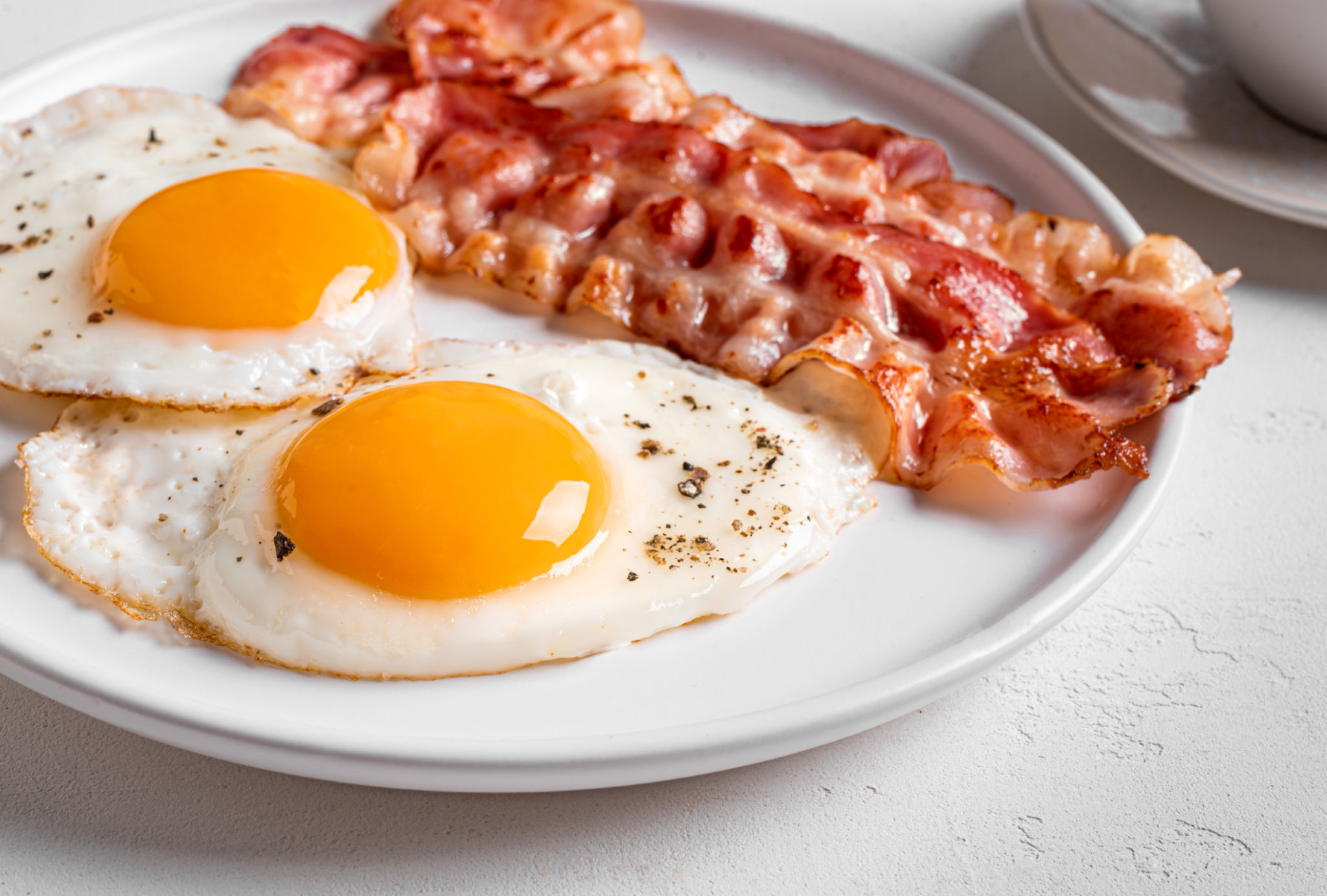 Fried eggs and fried bacon Fried eggs and fried bacon