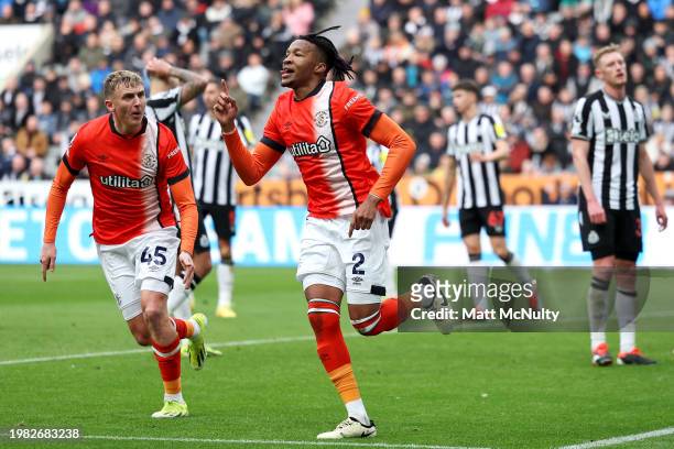 Gabriel Osho of Luton Town celebrates scoring his team's first goal during the Premier League match between Newcastle United and Luton Town at St....