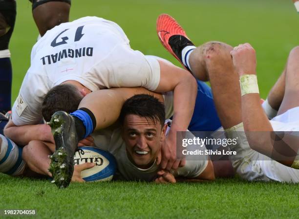 Alex Mitchell of England celebrates after scoring a try during the Guinness Six Nations 2024 match between Italy and England at Stadio Olimpico on...