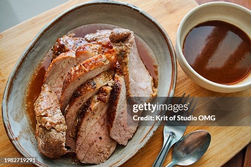 A plate of roasted pork slices A plate of roasted pork slices