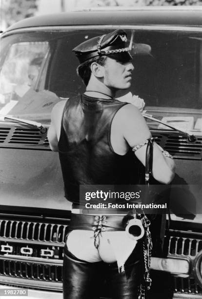 Man wears leather fetish clothing during the annual Gay Carnival in West Hollywood, California, 1982.