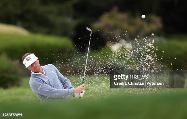 Keith Mitchell of the United States plays a shot from a bunker during the AT&T Pebble Beach Pro-Am at Pebble Beach Golf Links on February 03, 2024 in...