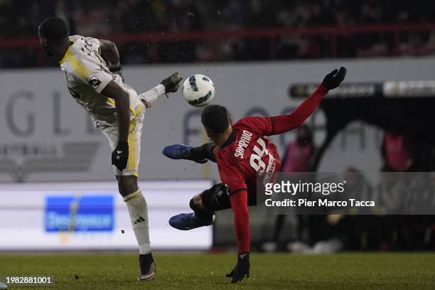 Aka Wilfried Kanga of Standard Liegi competes for the ball with Philipe Sampaio of RWDM Brussels FC during the Jupiler Pro League match between RWDM...