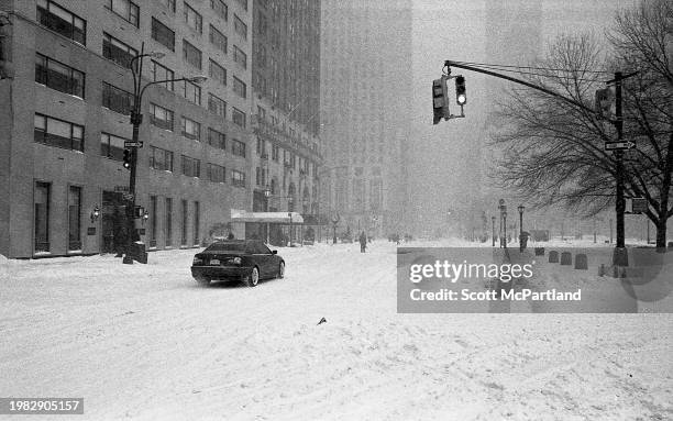 View, looking south, of a vehicle on 5th Avenue during the President's Day blizzard, New York, New York, February 17, 2003.