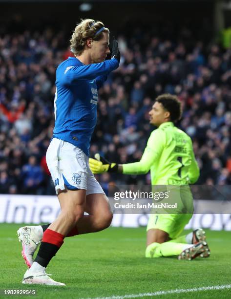 Todd Cantwell of Rangers celebrates after scoring his team's third goal during the Cinch Scottish Premiership match between Rangers FC and Livingston...