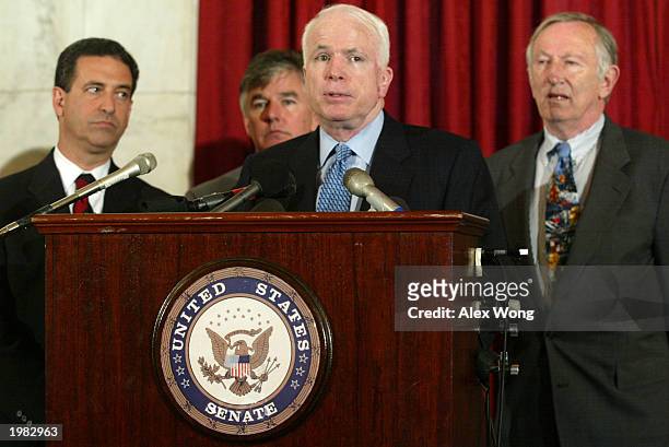 Senator John McCain speaks on the District Court's decision on the Campaign Reform Act as Senator Russ Feingold , Representative Martin Meehan and...
