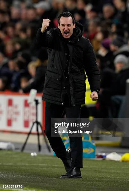 Aston Villa manager Unai Emery celebrates after his team's third goal during the Premier League match between Sheffield United and Aston Villa at...