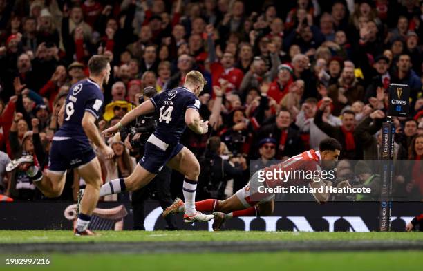 Rio Dyer of Wales scores his team's second try during the Guinness Six Nations 2024 match between Wales and Scotland at Principality Stadium on...