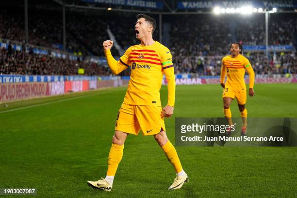 Robert Lewandowski of FC Barcelona celebrates scoring his team's first goal during the LaLiga EA Sports match between Deportivo Alaves and FC...
