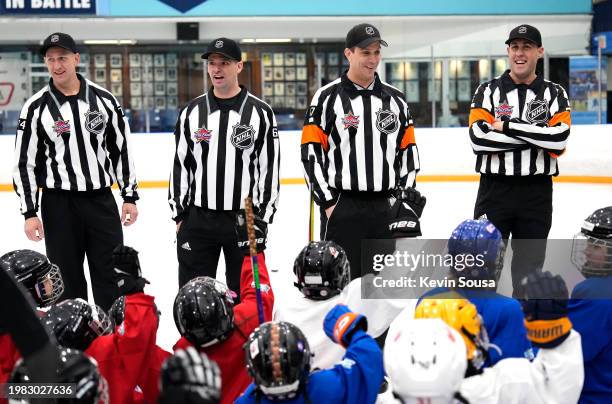 Referees speak to youth participants during the 2024 NHL All-Star Youth Hockey Jamboree Celebration at St. Michael's College School Arena on February...