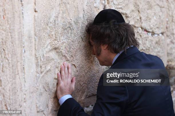 Argentina's President Javier Milei prays at the Western Wall, the last remaining vestige of the Second Temple which is considered the holiest site...