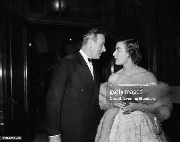 British naval officer and colonial administrator Louis Mountbatten, Earl Mountbatten of Burma, wearing a tuxedo and bow tie, with his daughter,...