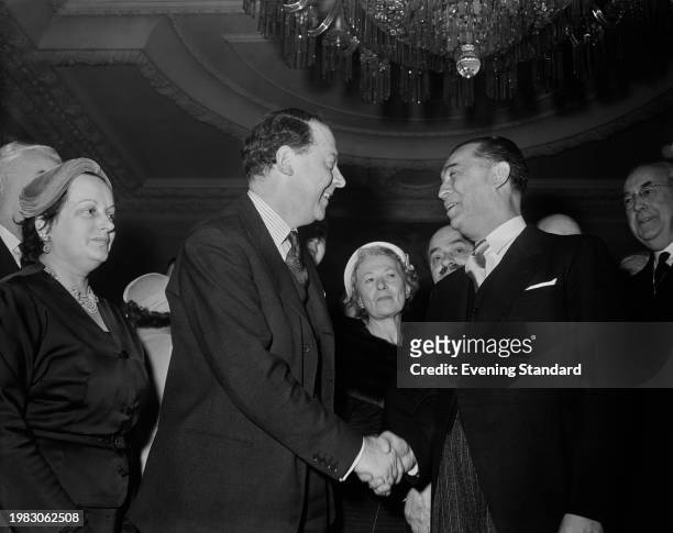 British politician Hugh Gaitskell, leader of the Labour Party, shakes hands with Brazilian politician Juscelino Kubitschek, President-elect of...