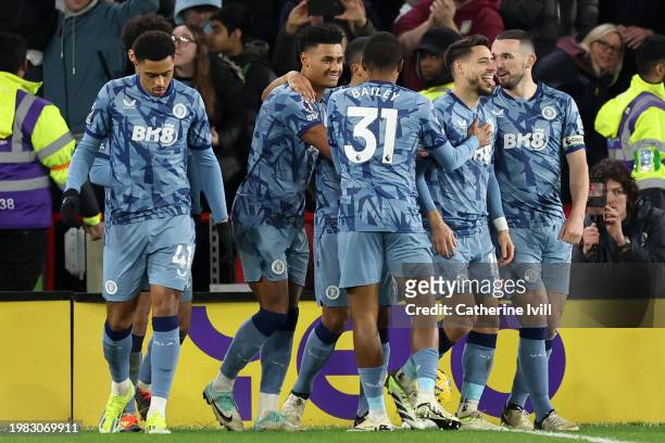 Alex Moreno of Aston Villa celebrates scoring his team's fifth goal with teammates during the Premier League match between Sheffield United and Aston...