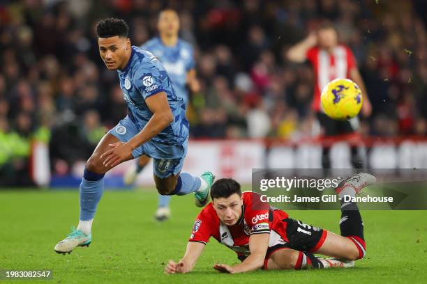 Ollie Watkins of Aston Villa battles for possession with Anel Ahmedhodzic of Sheffield United during the Premier League match between Sheffield...