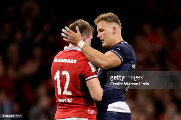 Duhan van der Merwe of Scotland consoles Nick Tompkins of Wales at full-time following the Guinness Six Nations 2024 match between Wales and Scotland...