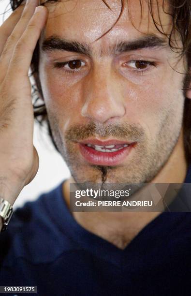 Midfielder Robert Pires, replying to journalists' questions concerning the French Teams' training at Clairefontaine near Paris, 14th June 2003,...