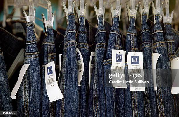 Jeans are shown on a rack at a Gap retail store May 8, 2003 in San Francisco. San Francisco based Gap Inc. Reported today that same-store April...
