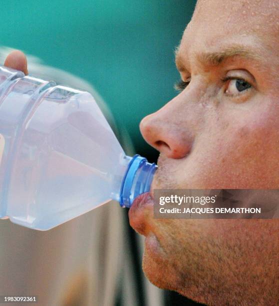 Netherlands' Martin Verkerk drinks water 01 June 2003 in Paris, during his Roland Garros French Tennis Open fourth round match against his German...