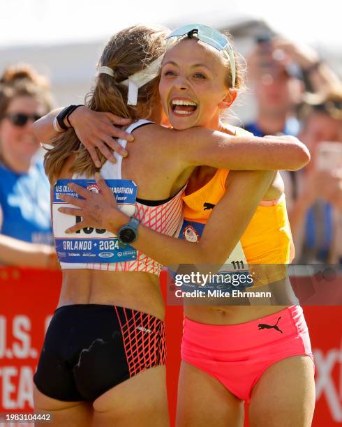 Emily Sisson and Dakotah Lindwurm celebrate after placing second and third during the 2024 U.S. Olympic Team Trials - Marathon on February 03, 2024...