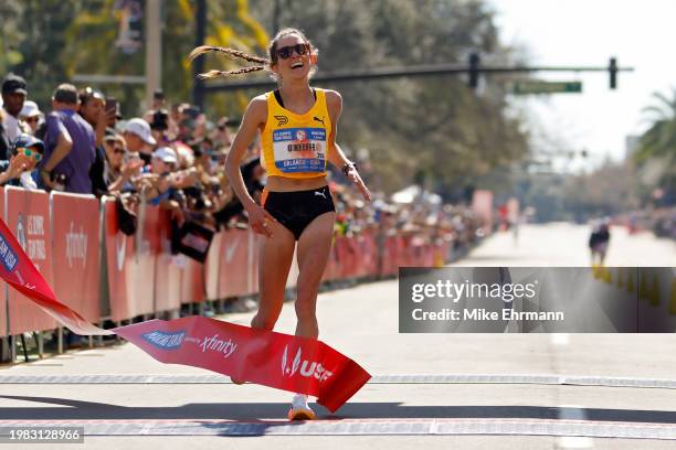 Fiona O'Keeffe crosses the finish line to place first during the 2024 U.S. Olympic Team Trials - Marathon on February 03, 2024 in Orlando, Florida.