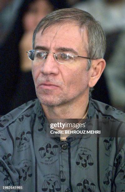 Behrouz Geranpayeh, head of the National Society of Public Opinion Studies, sits during his trial along with Abbas Abdi, a top figure in Iran's main...