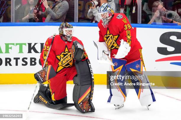 Thatcher Demko of the Vancouver Canucks and Cam Talbot of the Los Angeles Kings of Team Hughes warm up before the 2024 Honda NHL All-Star Game at...