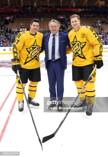 Sidney Crosby of the Pittsburgh Penguins, Head coach Rick Bowness of the Winnipeg Jets and Nathan MacKinnon of the Colorado Avalanche pose for a...