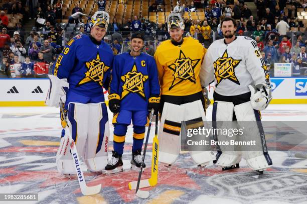 Jake Oettinger of the Dallas Stars, Celebrity Captain Justin Bieber of Team Matthews, Jeremy Swayman of the Boston Bruins and Connor Hellebuyck of...