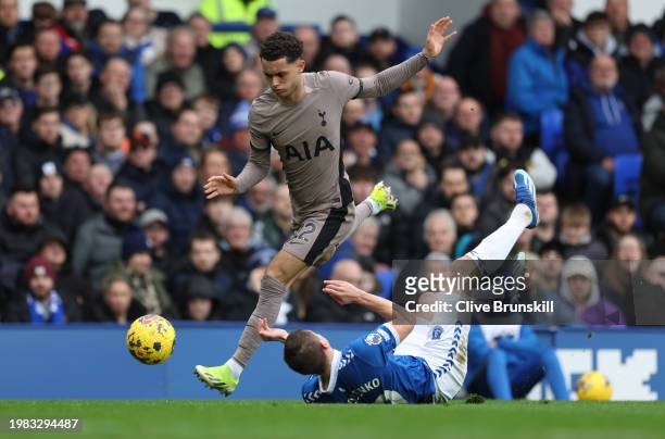 Vitaliy Mykolenko of Everton is challenged by Brennan Johnson of Tottenham Hotspur during the Premier League match between Everton FC and Tottenham...