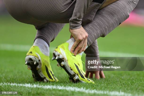 Timo Werner of Spurs holds his ankle during the Premier League match between Everton FC and Tottenham Hotspur at Goodison Park on February 03, 2024...
