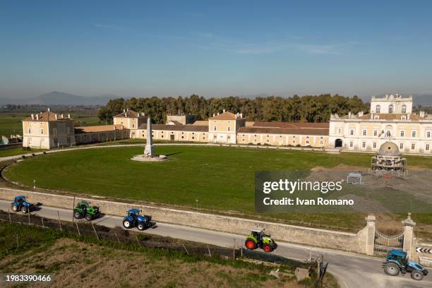 Column of tractors during a farmers' protest near the Bourbon Royal Palace of Carditello on February 03, 2024 in San Tammaro, Italy. Farmers and...