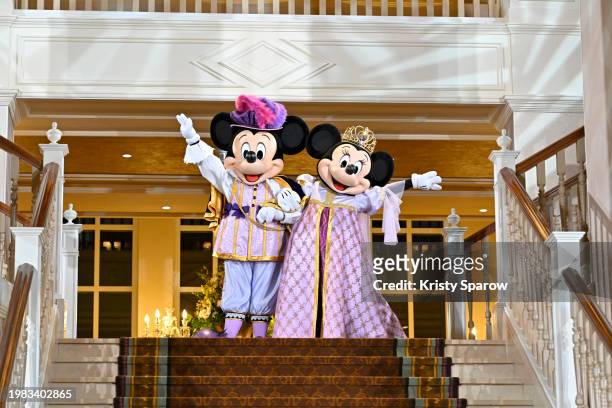 Disney characters Mickey Mouse and Minnie Mouse perform in the Royal Ball lobby during the Disneyland Hotel reopening celebration at Disneyland Paris...