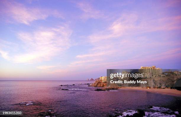 Group of high-end condominiums along the shore of the Sea of Cortez near the city of Cabo San Lucas, at sunrise, Baja del Sur, Mexico, 2005. .