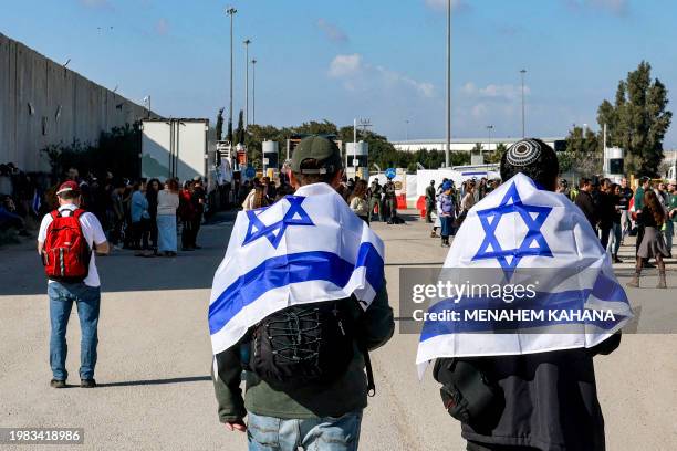 Right-wing Israeli protesters gather to block the entry of humanitarian aid trucks to the Gaza Strip, on the Israeli side of the Kerem Shalom border...