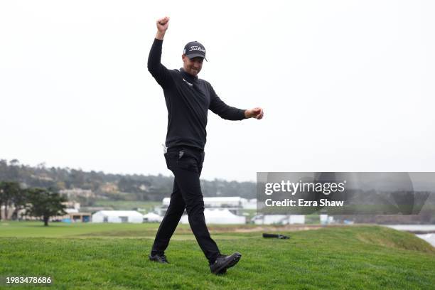 Wyndham Clark of the United States walks off the 18th green after recording a score of 60 during the AT&T Pebble Beach Pro-Am at Pebble Beach Golf...
