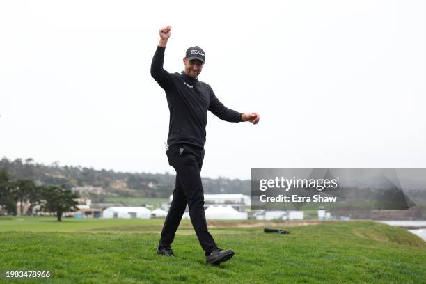 Wyndham Clark of the United States walks off the 18th green after recording a score of 60 during the AT&T Pebble Beach Pro-Am at Pebble Beach Golf...