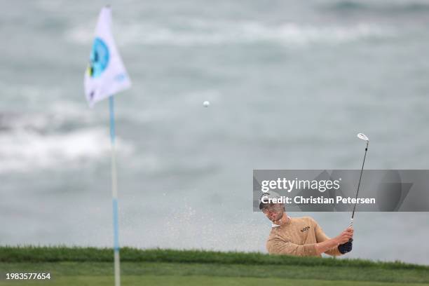 Thomas Detry of Belgium plays a shot from a bunker on the eighth hole during the AT&T Pebble Beach Pro-Am at Pebble Beach Golf Links on February 03,...