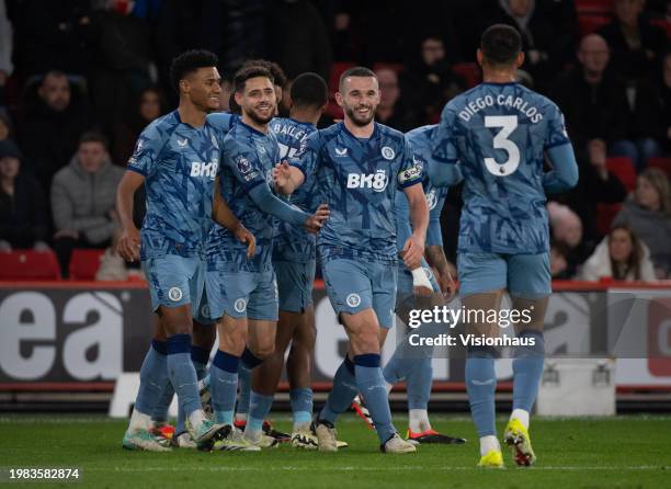 John McGinn of Aston Villa celebrates his team's second goal with team mates Ollie Watkins, Alex Moreno and Diego Carlos during the Premier League...