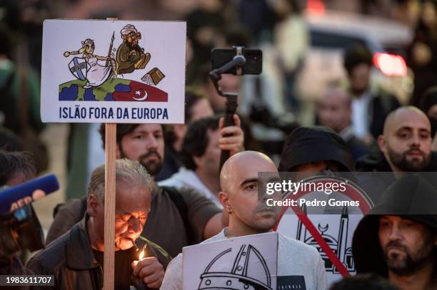 Demonstrator holds up a sign that reads: "Islam out of Europe" during an anti-Islamic demonstration on February 03, 2024 in Lisbon, Portugal. The...