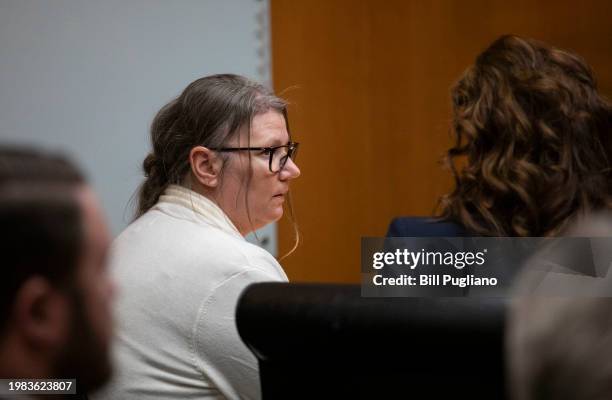 Jennifer Crumbley, the mother of Oxford, Michigan high school shooter Ethan Crumbley, sits with her attorney, Shannon Smith, in Oakland County...