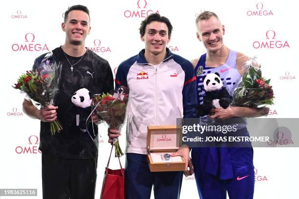 Second placed USA's KC Lightfoot, winner Sweden's Armand Duplantis and third placed USA's Sam Kendricks pose after the Mondo Classic pole vault gala...