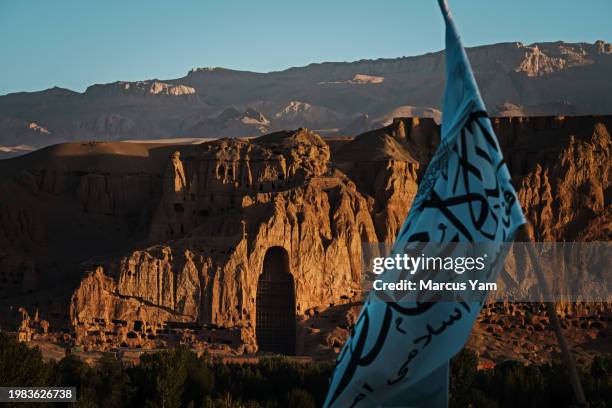 Sun rise illuminate the void where the Buddha statue once stood before the Taliban destroyed it in their previous reign in 2001, with the new...