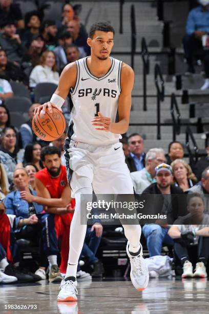 Victor Wembanyama of the San Antonio Spurs looks on during the game against the Washington Wizards on January 29, 2024 at the Frost Bank Center in...
