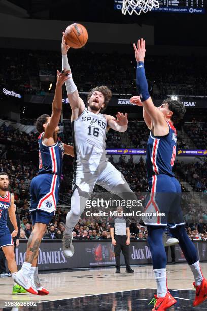 Cedi Osman of the San Antonio Spurs drives to the basket during the game against the Washington Wizards on January 29, 2024 at the Frost Bank Center...