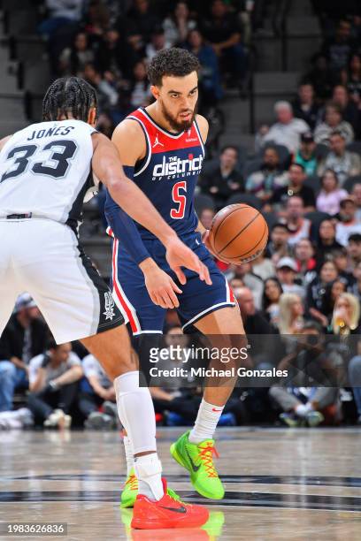 Tyus Jones of the Washington Wizards dribbles the ball during the game against the San Antonio Spurs on January 29, 2024 at the Frost Bank Center in...