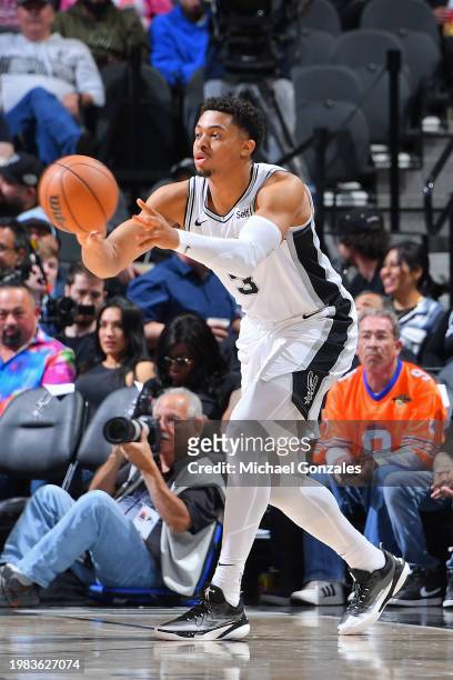 Keldon Johnson of the San Antonio Spurs passes the ball during the game against the Washington Wizards on January 29, 2024 at the Frost Bank Center...