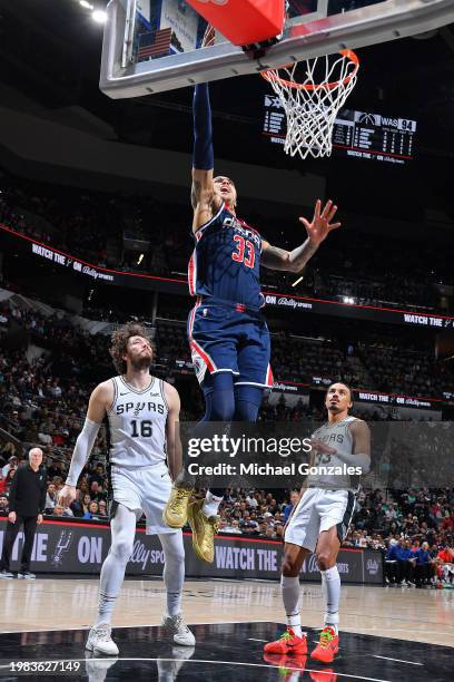 Kyle Kuzma of the Washington Wizards drives to the basket during the game against the San Antonio Spurs on January 29, 2024 at the Frost Bank Center...